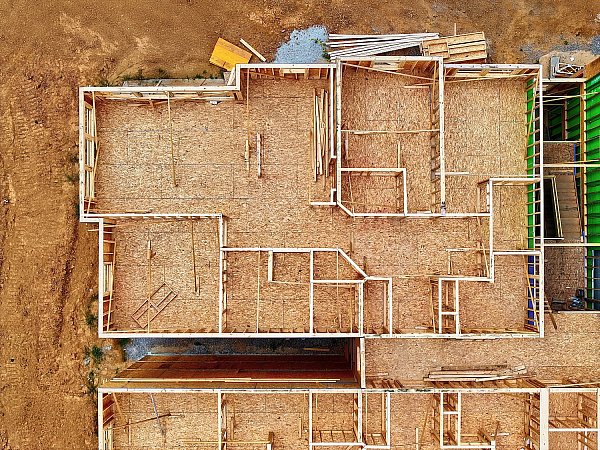 aerial construction progress photo of frame of building